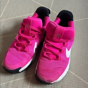 Nike Hot Pink Running Shoes with White Swoosh and Black Heel